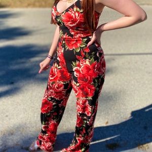 Women’s ‘Windsor’ floral romper with cute design on back !